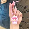 Figura de juguete linda de niña sentada flockeada creativa llavero DIY colgante de mochila decoración de llavero al por mayor