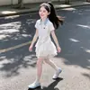 Conjunto de Camisa Polo de Manga Curta Doce de Verão para Meninas e Saia 2026 Novo Estilo Roupas Super Bonitas para Crianças Meninas e Crianças Maiores