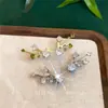 Pendientes de botón redondos de circonita chapados en oro real de 14 quilates, lujo ligero, alta gama, modernos y exquisitos, pendientes simples y versátiles para mujer