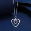 Collar de proyección popular transfronterizo nuevo y simple en forma de corazón 100 idiomas Te Amo Colgante de amor con foto a color HD