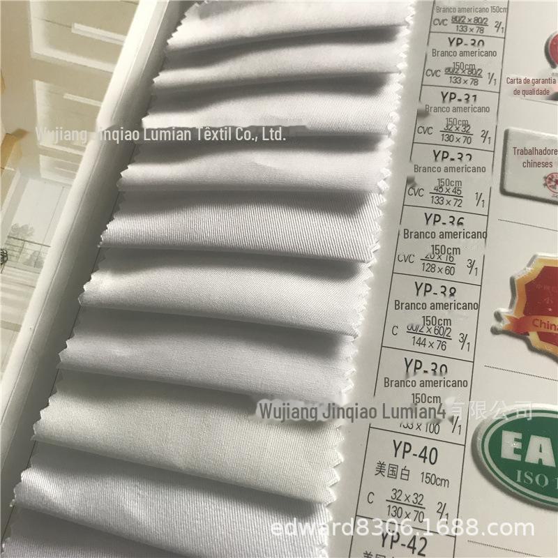 涤棉美国白色卡股线斜纹.jpg