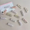 Cuentas cilíndricas de dos agujeros, translúcidas, con estampado de dibujos animados y polvo dorado, para cadenas y accesorios hechos a mano para bolsas de teléfono DIY