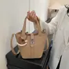 Bolso de Mano Simple Estilo Coreano con Patrón de Lichi para Mujer 2026 Nueva Moda de Gama Alta Versátil Bolso Cruzado Cubo