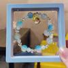 Pulsera de cuentas estilo étnico nuevo caja de regalo al por mayor pulsera de cristal de imitación adornos de mano con textura de mariposa puesto del mercado nocturno