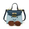 Bolso de mano transfronterizo para mujer, nueva colección otoño/invierno, diseño de cara sonriente linda, mini bolso Kelly, elegante, adecuado para niñas, a juego para padres e hijos, y divertido bolso cruzado de pintalabios