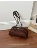 Bolso bowling retro de gamuza de nicho coreano para mujer, nuevo bolso de hombro de gran capacidad de moda otoño/invierno 2026