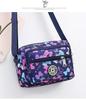 Bolsa de pano de flores Nova bolsa crossbody feminina Pano Oxford Bolsa de mãe de meia-idade e idosa Bolsa Bolsa de ombro multicamadas Bolsa de lona