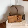 Bolso vintage de gamuza para mujer, nueva moda de otoño 2026, bolso tote de alta gama para el trabajo, bolso de hombro de gran capacidad