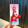 Llavero Colgante Creativo de Pompones de Estrella de Cinco Puntas para Bolsos de Niñas Llavero Acrílico Pequeño Regalo al por Mayor