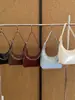 Bolsa de ombro transfronteiriça de alta qualidade para mulheres, nova moda outono 2026, bolsa crossbody de couro macio, bolsa de mão versátil e bolsa de ombro