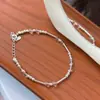 Pulsera tejida a mano de plata de ley S925 con cuentas redondas de cristal blanco y nudo de bambú, Pulsera de diseño de nicho de lujo ligero de moda