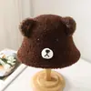 Venta al por mayor 25 Años Otoño e Invierno Nuevo Disparo Real Sombrero de Pescador Engrosado Estilo Extranjero Resistente al Frío Dibujo Animado Lindo Orejas de Oso Felpa