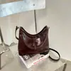 Nueva colección otoño/invierno 2026: Bolso de mano coreano simple, retro, moderno y versátil con un toque de alta gama, diseñado para mujeres, y se puede llevar como bandolera o bolso de hombro
