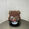 Bonitos y adorables gorros de otoño e invierno para niños, con diseño de poner, material de punto y una serie de dibujos animados, que brindan abrigo y protección para los oídos para bebés y niños pequeños.