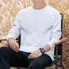 Camiseta casual versátil de manga larga para hombre para otoño, cuello redondo, color liso moderno, cómoda, transpirable y de corte holgado.