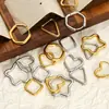 Pendientes minimalistas de acero inoxidable transfronterizos europeos y americanos, pendientes geométricos de hexágono dorado, aros de acero de titanio únicos y versátiles