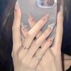 Nail art usar unha mão gelo através de olho de gato francês pasta de unha quebrada broca branca falsa unha patch unha peça atacado