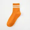Nuevos calcetines para mujer calcetines de dos rayas japonesas calcetines para parejas puesto calcetines de algodón retro fabricantes al por mayor
