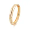 Pulsera lisa de aleación irregular, pulsera para mujer estilo europeo y americano con cierre de resorte liso, suministro transfronterizo Xiyin, venta al por mayor directa del fabricante de origen