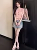 Vestido traje casual chic estilo coreano para mujer, nuevo modelo verano 2025, conjunto de dos piezas de cárdigan de manga corta y media falda que reduce la edad