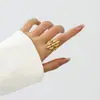 Joyería de Moda Popular Transfronteriza con Flor Hueca y un Toque Único de Alta Gama, Anillo Abierto para Mujer con Diseño Irregular
