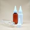 Venta al por mayor, en stock, botella de plástico extruido transparente de 30 ml, botella de muestra de subbotella de mezcla de color de pigmento, botella de boca puntiaguda con pulverizador de polvo PET