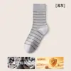 Nueva colección Otoño/Invierno 2026: calcetines de media pantorrilla para mujer con patrón de rayas marrones, estilo coreano, modernos y versátiles calcetines a rayas