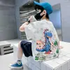Camiseta Infantil de Algodão Puro Manga Curta 2026 Verão Estilo Coreano para Meninos Versátil Tops para Estudantes para Crianças Pequenas e Médias e Bebês Roupas Infantis Camisetas da Moda