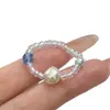 Anillo de Cristal Azul Transparente Perlado con Diseño Elegante para Verano, Banda Elástica Ajustable, Suave y Favorecedor, Anillo Versátil
