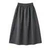 Falda midi gruesa de color gris oscuro con estampado floral para mujer, nueva colección otoño 2026, con cintura elástica, diseñada para estilizar la figura y crear un efecto adelgazante