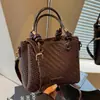 Bolso tejido con patrón transfronterizo para mujer, nuevo y versátil bolso tipo cubo de otoño 2026 para el trabajo, moderno bolso retro de hombro y cruzado