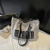 Bolso de Hombro Único de Gran Capacidad con Textura de Moda para Mujer 2025 Nuevo de Moda Estudiante Clase Viaje Diario Bolso Tote con Letras