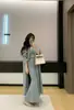 Nuevo Conjunto de Tres Piezas de Punto para Mujer Otoño/Invierno 2026, Top de Tubo + Falda de Cintura Alta + Cárdigan Largo, Estilo 'Hot Girl' de Deseo Puro