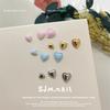 Aleación de uñas japonesa tamaño grande mediano pequeño amor joyería mini corazón de durazno retención de color uso uña decoraciones DIY al por mayor