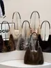 Bolso de mano retro transfronterizo nuevo otoño/invierno, bolso de hombro de cadena moderno y elegante, bolso de hombro de felpa versátil y chic