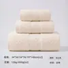 Suministro transfronterizo de toallas de baño absorbentes, suaves y amigables con la piel, no propensas a soltar pelusa, adecuadas para uso doméstico como toallas faciales y de baño, personalizables con logotipo