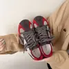 Zapatillas de entrenamiento casual retro de otoño para mujer con bloques de color, nuevas 2026, zapatillas de lona planas azules versátiles