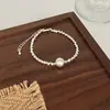 Pulsera de Perlas Shijia para Niña Apilada Doble Capa Redonda Lujo Ligero Nicho Exquisita Pulsera de Perlas Francesas Nuevo Estilo 2025