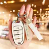 Adecuada para la última llave inteligente del Hyundai Tucson L, esta es una funda protectora de alta gama para la llave del coche Tucson de quinta generación, diseñada tanto para hombres como para mujeres
