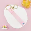 Llavero Colgante de Cordón de Cuero con Letra Transparente Brillante con Accesorios Estilo Muñeca Rellena de Aceite Encanto de Llavero Pulsera Venta al por Mayor