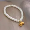 Pulsera Elástica Ajustable de Jade Hotan para Mujer Cosas Buenas Loto Colgante Oro Arena Diseño Estilo Étnico Joyería Pulsera Regalo