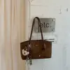 Bolsa tote simples, de cor sólida, de grande capacidade para trabalho e deslocamento, bolsa feminina, nova bolsa casual de ombro única da moda 2026, bolsa grande, estilo moderno