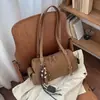 Bolsa de Mão tipo Almofada Fosca Retro 2026 Outono/Inverno Nova Versátil para Trabalho Ombro Casual Simples Bolsa Boston