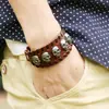 Pulseira de couro punk direto da fábrica Europeia e Americana Vintage tecida caveira couro de vaca pulseira joias de estrela