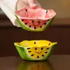 Cuenco pequeño irregular de sandía con cara sonriente pintado a mano de fábrica, cuenco de ensalada de cerámica para uso doméstico, cuenco para cenar, vajilla linda de color bajo vidriado