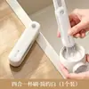 Cepillo de limpieza de tazas cuatro en uno, una herramienta versátil para limpiar tazas, termos y tapas de botellas, con una ranura en forma de U para limpiar áreas difíciles de alcanzar