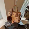 Bolso de mano de lunares de moda transfronterizo para mujer, nuevo bolso cubo de nicho estilo coreano para el día a día, bolso de hombro y cruzado para el día a día