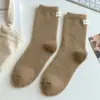 Calcetines de Velour Australiano Grueso con Etiqueta de Tela para Mujer, Colores Maillard, para Dormir, Media Pantorrilla, Confinamiento, Otoño e Invierno 2025, Venta al por Mayor