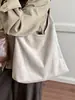 Yaozi 2026 bolso tote casual versátil de moda temprana, bolso de hombro grande de capacidad para el trabajo, retro simple