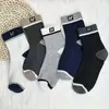 Calcetines para hombre y mujer, calcetines cortos para primavera y verano, color liso, finos, absorbentes de sudor, transpirables, negros, blancos, grises, calcetines invisibles, antideslizantes, que no se caen, calcetines de puesto callejero